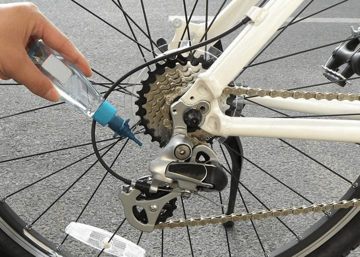 Oiling a bike sale